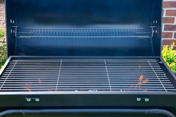 Obraz premium BBQ warming up to cook food