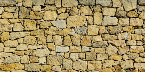  close up of wall of stone in the south of france