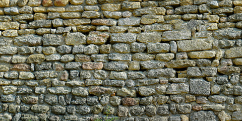  close up of wall of stone in the south of france