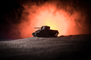 War Concept. Military silhouettes fighting scene on war fog sky background, Silhouette of armored...