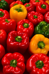 Fresh red, green, yellow bell pepper background.