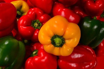 Fresh red, green, yellow bell pepper background.