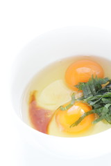 raw egg and shiso herbal with soy sauce for cooking image