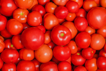 Tomatoes texture. Fresh juicy red tomatoes