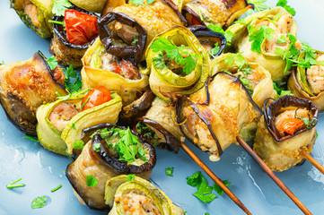 Eggplant with meat on skewers