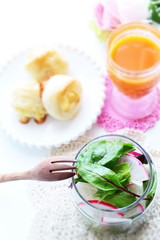 baby spinach and radish salad served with bread