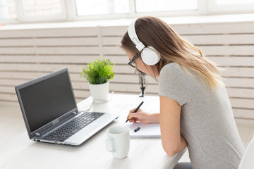 Radio host, streamer and blogger concept - Woman working as radio host at radio station sitting in...