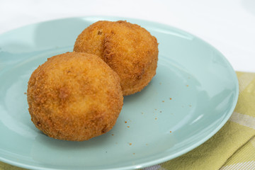 Sicilian Arancino or Arancina. A typical Sicilian street food.