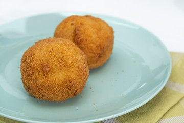 Sicilian Arancino or Arancina. A typical Sicilian street food.
