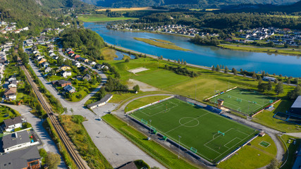 Aerial view of a smal sports soccer football field in a village