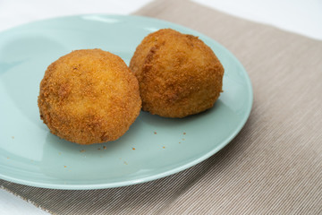 Sicilian Arancino or Arancina. A typical Sicilian street food.