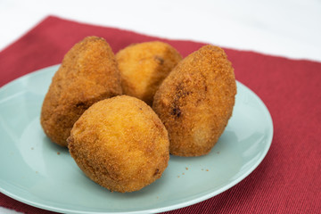 Sicilian Arancino or Arancina. A typical Sicilian street food.