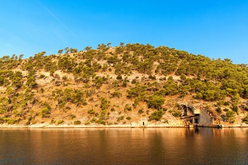Submarine and ship bunker on Lastovo island, Croatia. Concrete bunker shelter for submarines in...