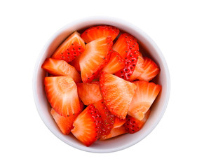 Strawberry Pieces in white bowl on white background