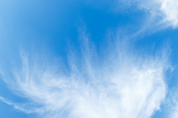 Fantastic soft white clouds against blue sky background soft focus