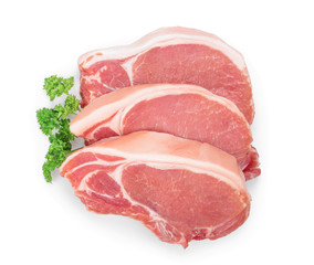 sliced raw pork meat with parsley isolated on white background. Top view. Flat lay