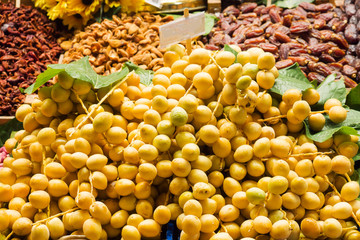 Yellow palm berries and dried fruits in Istanbul street market.