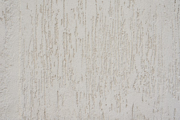 Decorative light gray plaster texture as background