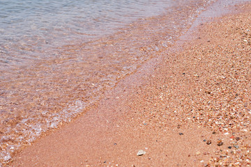 Sea or ocean waves on a stone coast beach