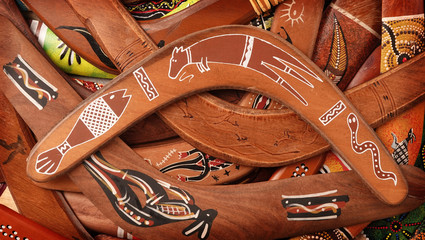 Boomerangs huge pile of traditional aboriginal weapons - obrazy, fototapety, plakaty