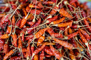 A group of dried thai chilli peppers