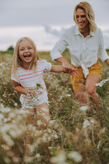 Mother and daughter spending time together outdoors