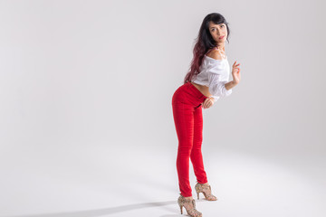 Latin dance, bachata lady, jazz modern and vogue dance concept - Beautiful young woman dancing on...
