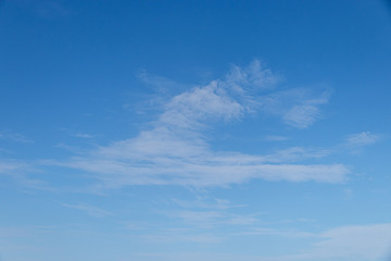 Naklejka na ściany i meble Fantastic soft white cloud against blue sky background soft focus