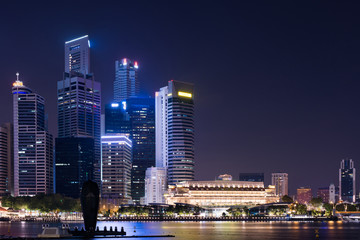 Fototapeta na wymiar Cityscape downtown. Night city urban skyline Singapore