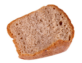 Piece of not fresh rye bread isolated on a white background
