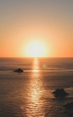 iconic shot of sunset at capo sandalo in the Island of San Pietro, Sardinia