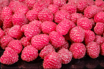 Ripe and fresh raspberries, sweet red raspberries, berries food