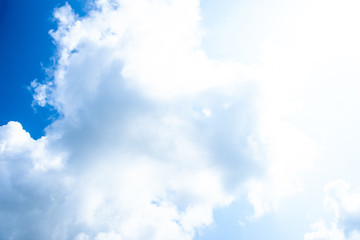 Nature Bright blue Sky with white clouds on blackground. Beautiful sky and clouds in the afternoon.