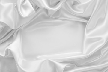 Delicate satin draped fabric white texture for festive backgrounds