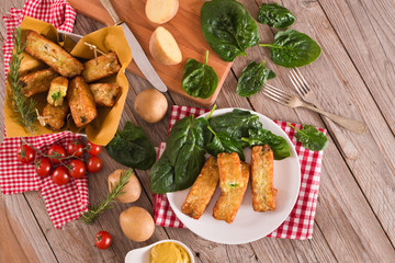 Potato croquettes with spinach and mozzarella.