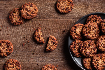 Chocolate chip cookies on a wooden background