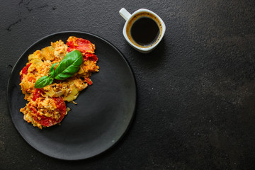scrambled eggs  tomatoe - breakfast delicious and healthy, menu concept. food background. copy space