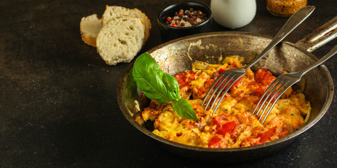 scrambled eggs  tomatoe - breakfast delicious and healthy, menu concept. food background. copy space