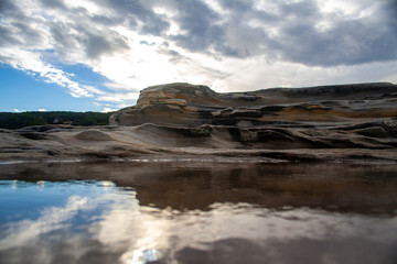 Rock formation and it's reflection in the water