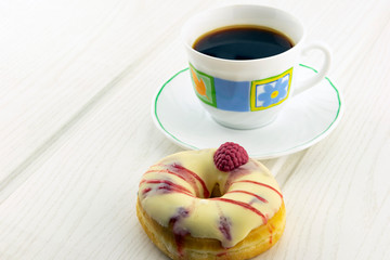 Coffee and glazed donut