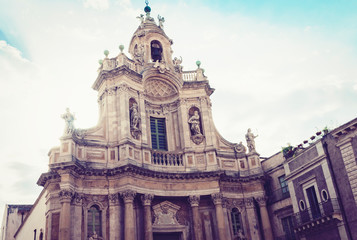 Fototapeta na wymiar Beautiful cityscape of Italy, facade of old cathedral in Catania, Sicily, Basilica della Collegiata, famouse baroque church.