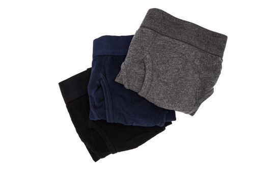 Three Folded Men's Briefs on White