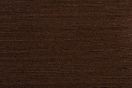Dark brown venge veneer background as part of your new home project. High quality texture in extremely high resolution. 50 megapixels photo.