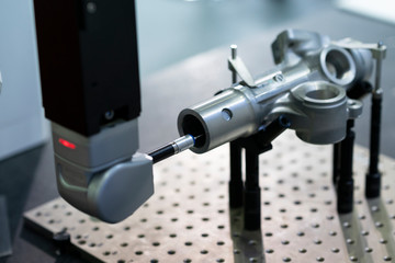 operator inspection high precision part by CMM coordinate measuring machine
