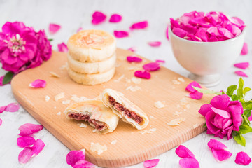 Fresh flower cake of Yunnan, China on the cutting board 