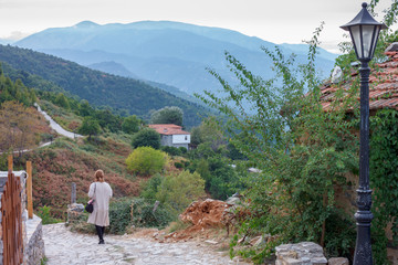Fototapeta na wymiar Palaios Panteleimonas village with old stonemason buildings on the foothills of Olympus mountain