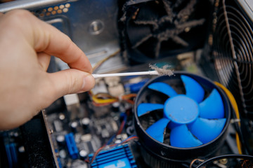 Dust on computer pc processor cooler with mainboard. concept Component maintenance