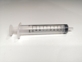 Syringe, white background