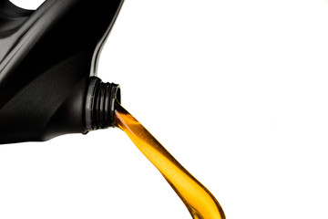 Pouring car oil  from bottle isolated on white background lubication engine transportation object design
