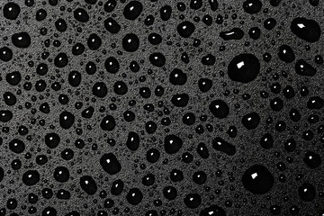 abstract water drops on a dark black  background